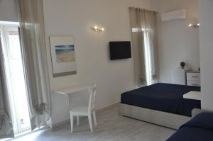 Llit o llits en una habitació de Brezza di mare Gaeta b&b