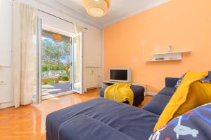 Telewizja i/lub zestaw kina domowego w obiekcie Apartment Macan, beautiful green oasis