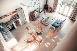 an overhead view of a table and chairs in a kitchen at Penhill Farm West Grange in Nuy