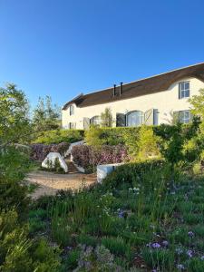 a house with a garden in front of it at Penhill Farm West Grange in Nuy