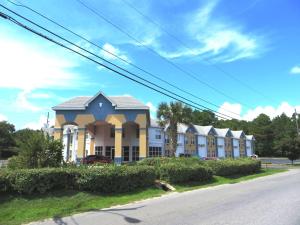 a row of buildings on the side of a street at Days Inn by Wyndham Panama City in Panama City