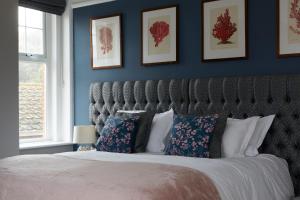 Кровать или кровати в номере Sentry Mead Hotel