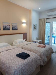 Postel nebo postele na pokoji v ubytování sofia's cozy rooms