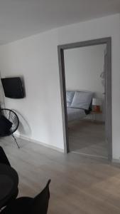 Telewizja i/lub zestaw kina domowego w obiekcie Apartament Port
