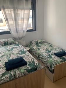 Postel nebo postele na pokoji v ubytování Apartamento de Ensueño