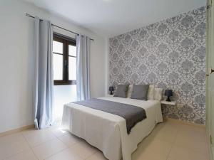 Postel nebo postele na pokoji v ubytování Mahostly Apartamento Comillas PA