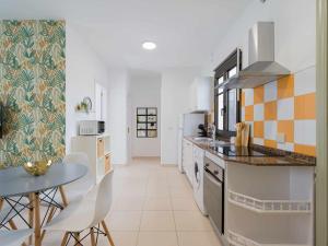 Kuchyň nebo kuchyňský kout v ubytování Mahostly Apartamento Comillas PA