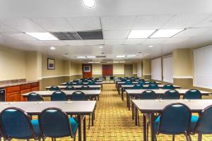 an empty classroom with tables and chairs in it at Days Inn by Wyndham Lebanon in Lebanon