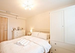 Postel nebo postele na pokoji v ubytování Dreamhouse Apartments Manchester City Centre