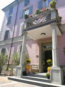 The facade or entrance of Hotel Verdi Boutique Hotel