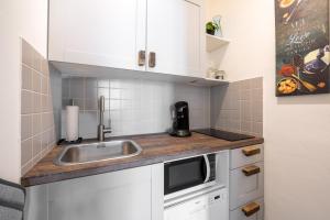Η κουζίνα ή μικρή κουζίνα στο Große Altstadtwohnung in TOP Lage Zentrum +10 φωτογραφίες
