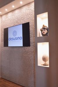 TV a/nebo společenská místnost v ubytování Desusino Residence & Hotel
