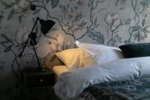 Rúm í herbergi á Hotel Siglunes