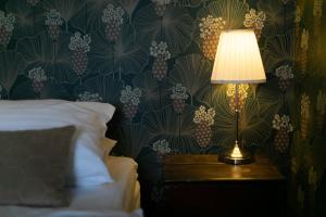 Rúm í herbergi á Hotel Siglunes