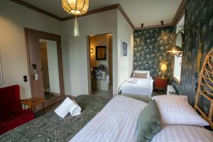 Rúm í herbergi á Hotel Siglunes