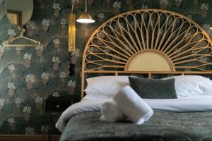 Rúm í herbergi á Hotel Siglunes