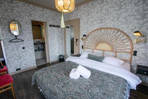 Rúm í herbergi á Hotel Siglunes