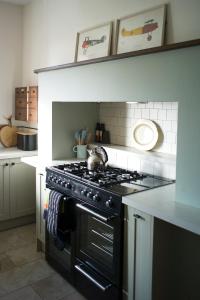 a kitchen with a black stove top oven at The Presbytery, Forres in Forres
