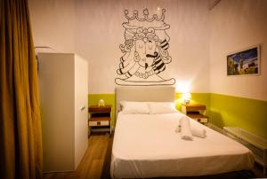 Posteľ alebo postele v izbe v ubytovaní The Yard Hostel