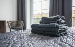 Posteľ alebo postele v izbe v ubytovaní Veltlin Bed & Wine