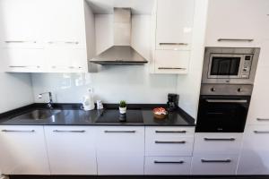 Küche/Küchenzeile in der Unterkunft Apartamentos en Leis Muxia