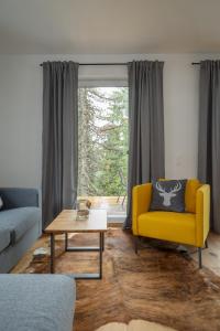 Posezení v ubytování Luxalps- Turrach Alm Chalets Nr 1-4 Grünsee- Sauna- Skifahren- Wandern- Natur