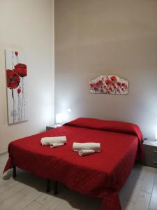 Giường trong phòng chung tại Appartamenti La Stella