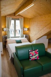 A bed or beds in a room at Turin Sweet Home