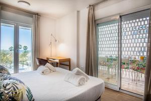 Postel nebo postele na pokoji v ubytování Apartamento en Milla Oro Marbella