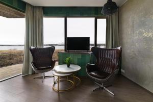 TV a/nebo společenská místnost v ubytování Hotel Kriunes