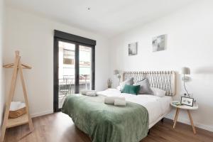 Katil atau katil-katil dalam bilik di Urban Chill Apartments by Olala Homes