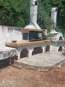 a model of a play house with a fireplace at Cozy Studio in Athens