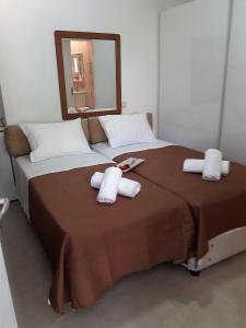 Posteľ alebo postele v izbe v ubytovaní Cozy Studio