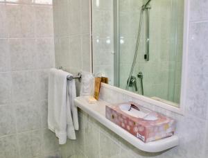 Koupelna v ubytování Hotel Cristina