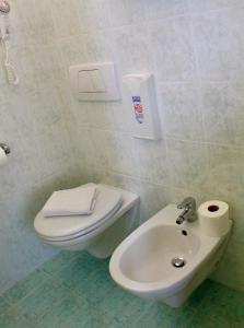 Koupelna v ubytování Hotel Cristina