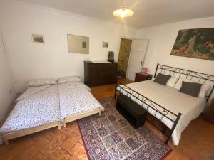 Postel nebo postele na pokoji v ubytování VECCHIO BORGO