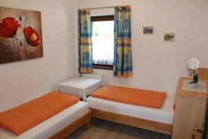 Postel nebo postele na pokoji v ubytování Haus Franz