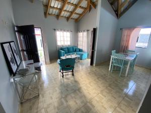 an aerial view of a living room with blue furniture at Oasis de paz 2 in Jarabacoa