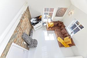 an overhead view of a living room with a couch at High Level - Properties Unique in Gateshead