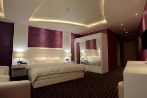 Postel nebo postele na pokoji v ubytování Orbis Design Hotel & Spa