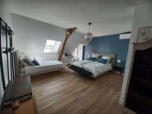 Rêve de Loire chambres d'hôtes au calme au pied des châteaux de la Loire客房内的一张或多张床位