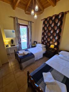 Afbeelding uit fotogalerij van Leopolis Stone House in Neokhórion