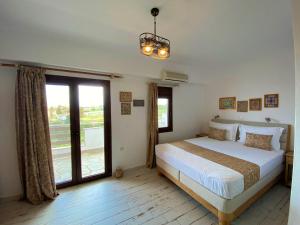 Postel nebo postele na pokoji v ubytování Marianna Sea View Afitos