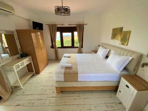 TV a/nebo společenská místnost v ubytování Marianna Sea View Afitos
