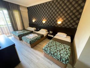 Postel nebo postele na pokoji v ubytování CASTLE PARK HOTEL