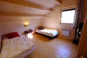 Postel nebo postele na pokoji v ubytování Gîte Cerf'titude