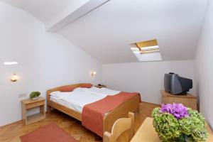 เตียงในห้องที่ Hotel Epario