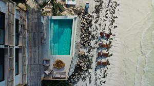 Vaizdas į baseiną apgyvendinimo įstaigoje Hotel Boutique Casa Muuch Holbox - Solo Adultos arba netoliese