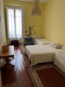 Ένα ή περισσότερα κρεβάτια σε δωμάτιο στο Cantabria