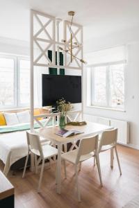 Televízia a/alebo spoločenská miestnosť v ubytovaní Lux Apartment II